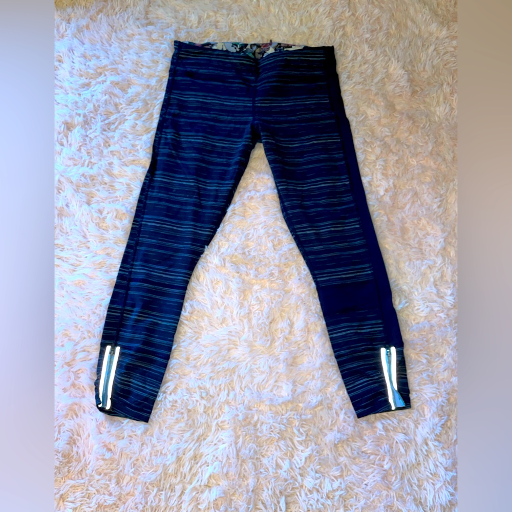 Lululemon Navy blue striped leggings with flowered waist band
